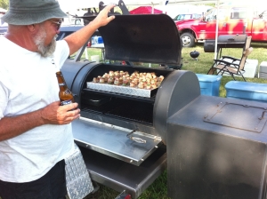 Terry Phillips (Hedge Hogs competition team) smoking jalapenos on his Yoder Smoker